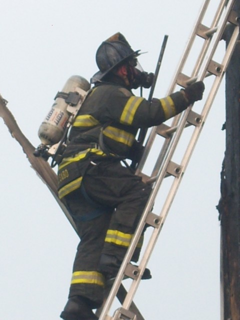 Specialist John Sabo working the exterior.